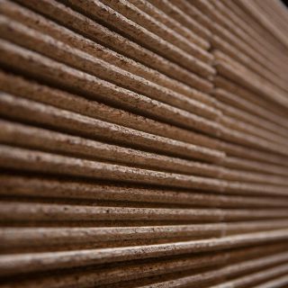 Close up of wooden boards stacked up